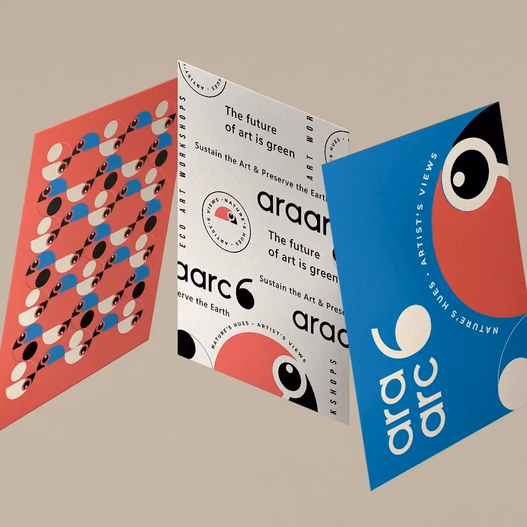 AraArc 6 exhibition brochures with colorful macaw patterns.