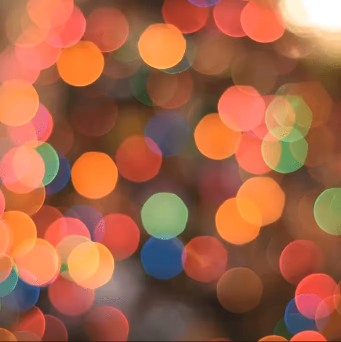 Illustration with colorful blurry dots on a gradient background, representing why email accessibility matters for inclusive communication.