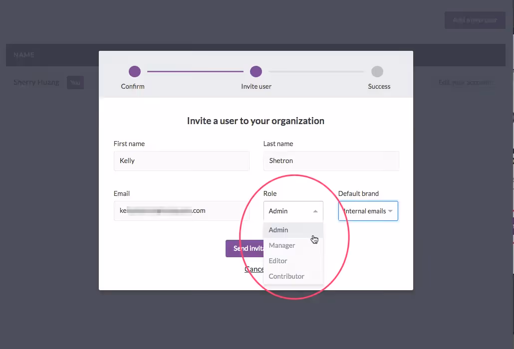 Form to invite a new user by entering name, email, assigning a role (Admin, Manager, Editor, Contributor), and default brand.