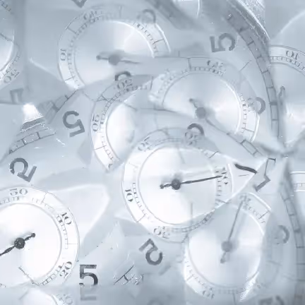 Abstract collage of overlapping analog stopwatches in grayscale, illustrating HTML email countdown timer tutorial.