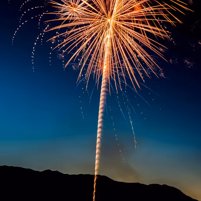 Golden fireworks bursting in the night sky, symbolizing celebration and key highlights from the top 10 email design lessons of 2017.