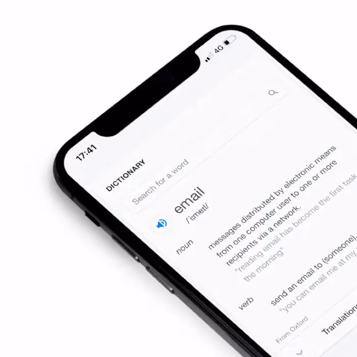 Smartphone screen showing the dictionary definition of “email” with search bar and white background.
