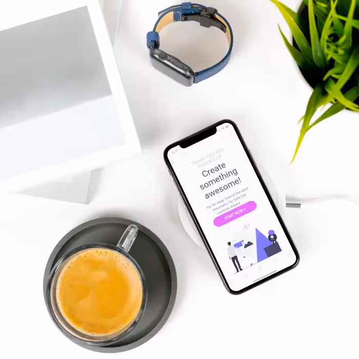 A smartphone displays a welcome email with a bold CTA, representing strategies for timing and subject lines in a welcome series.