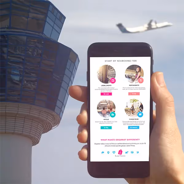 Smartphone with travel booking app, airport control tower, and airplane in sky—travel newsletter design inspiration.
