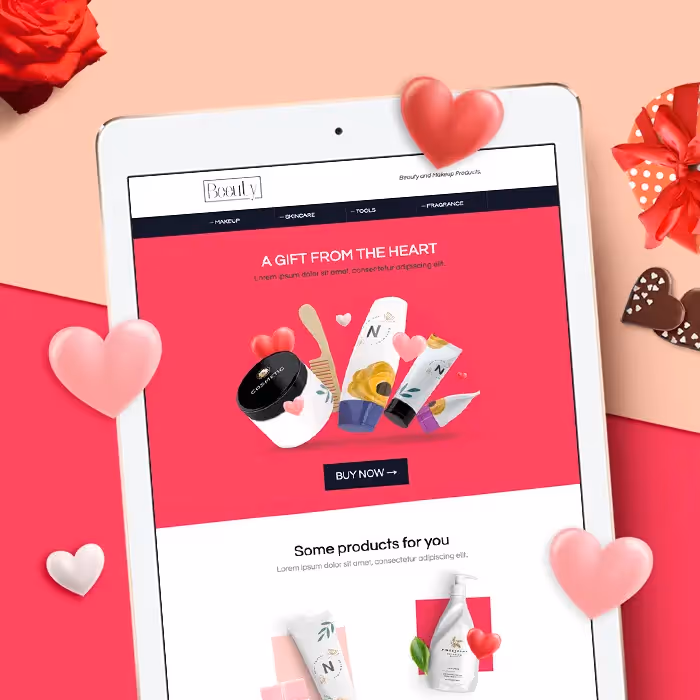 Valentine’s Day email ad on tablet with gifts, chocolates, hearts, and roses on a pink and red romantic background.