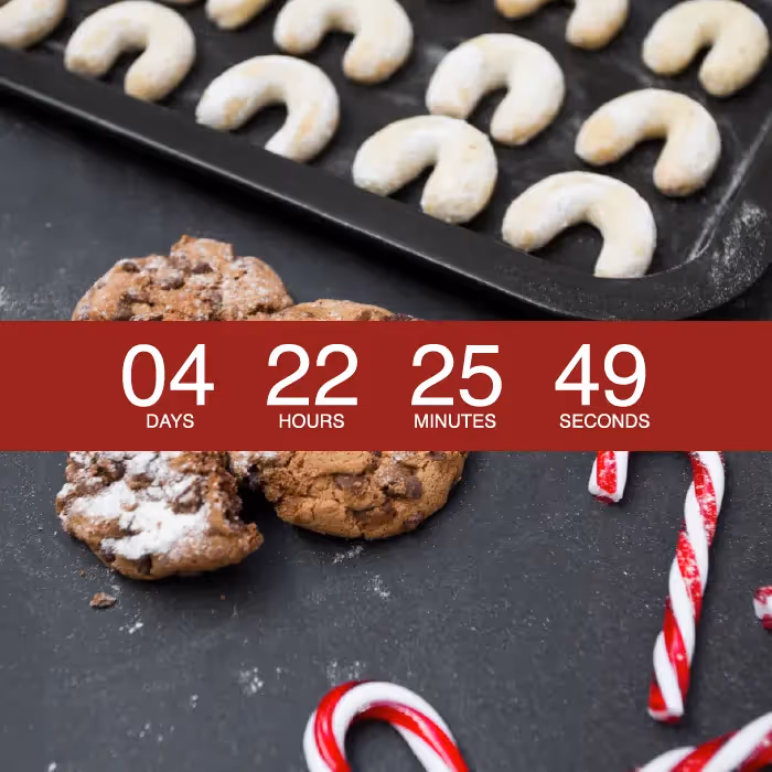 Christmas email design with holiday cookies, candy canes, and a bold red countdown timer showing days, hours, minutes, and seconds.
