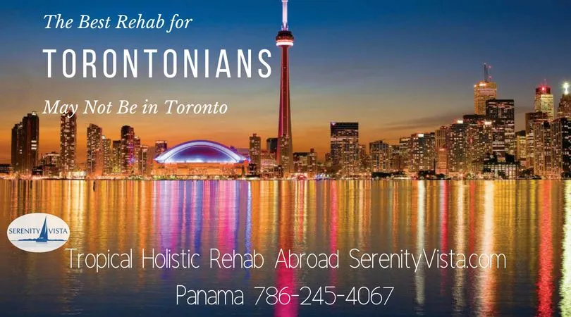 Toronto skyline at night with CN Tower and waterfront, used to promote private addiction treatment abroad in Panama.