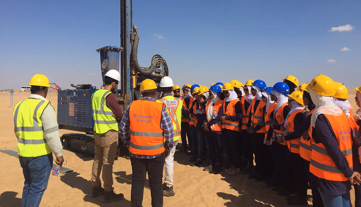 Workers taking a session in the field