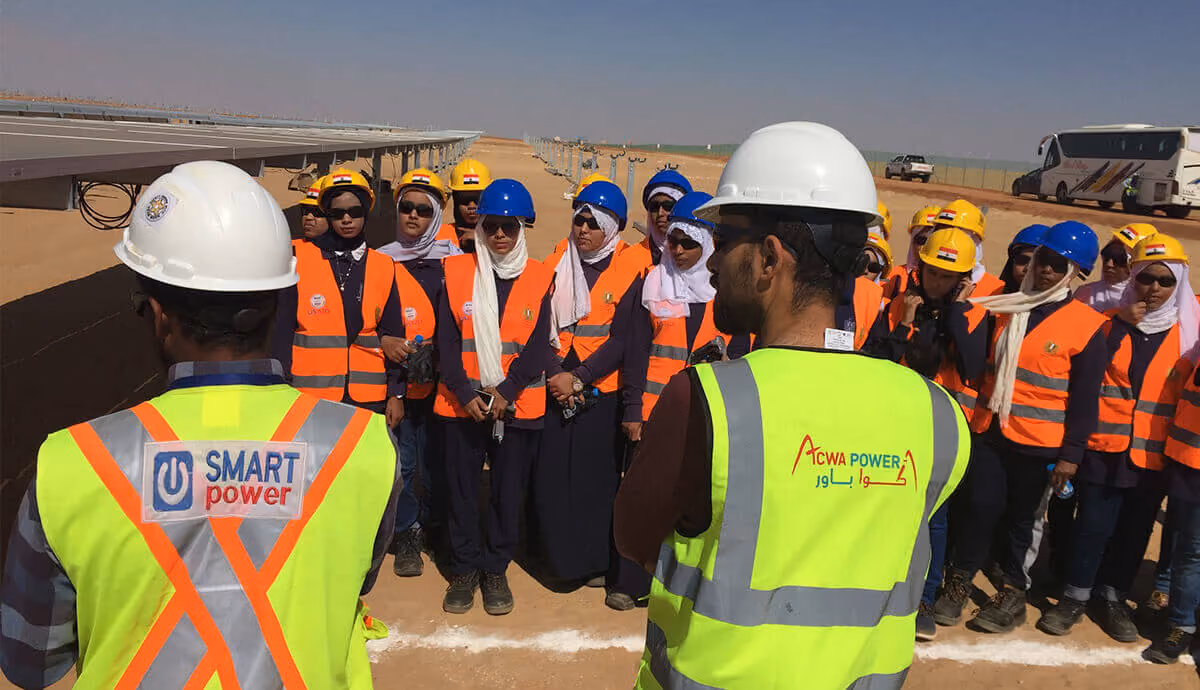 Workers taking a session in the field