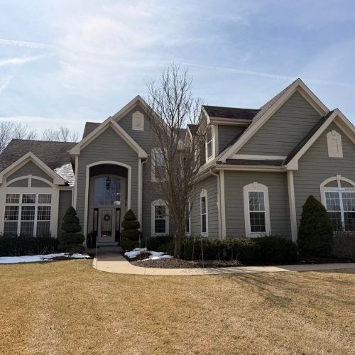 Residential siding installation by Northrup's Roofing & Restoration in Milwaukee, Wisconsin.