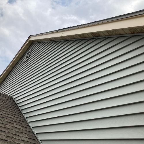 Completed roofing and siding project by Northrup's Roofing & Restoration in Milwaukee, Wisconsin.