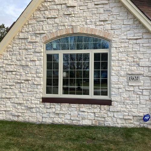 Completed window project by Northrup's Roofing & Restoration in Milwaukee, Wisconsin.