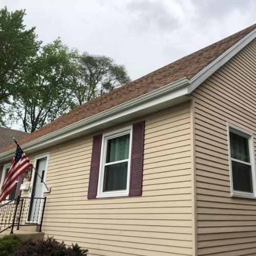 Completed roofing and siding project by Northrup's Roofing & Restoration in Milwaukee, Wisconsin.