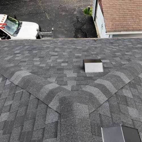 Completed asphalt roofing project by Northrup's Roofing & Restoration in Milwaukee, Wisconsin.
