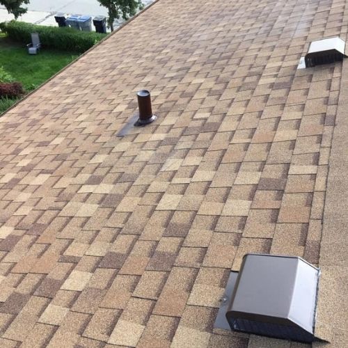 Completed asphalt roofing project by Northrup's Roofing & Restoration in Milwaukee, Wisconsin.