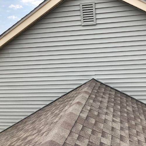 Completed roofing and siding project by Northrup's Roofing & Restoration in Milwaukee, Wisconsin.