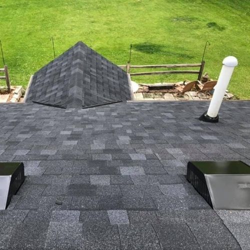 Completed asphalt roofing project by Northrup's Roofing & Restoration in Milwaukee, Wisconsin.