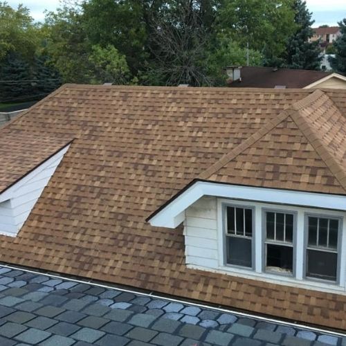 Completed asphalt roofing project by Northrup's Roofing & Restoration in Milwaukee, Wisconsin.