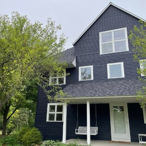Completed siding project by Northrup's Roofing & Restoration in Milwaukee, Wisconsin.