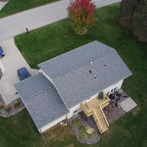 Completed asphalt roofing project by Northrup's Roofing & Restoration in Milwaukee, Wisconsin.