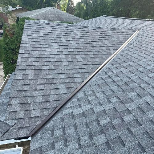 Completed asphalt roofing project by Northrup's Roofing & Restoration in Milwaukee, Wisconsin.