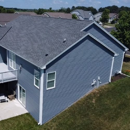 Completed roofing and siding project by Northrup's Roofing & Restoration in Milwaukee, Wisconsin.