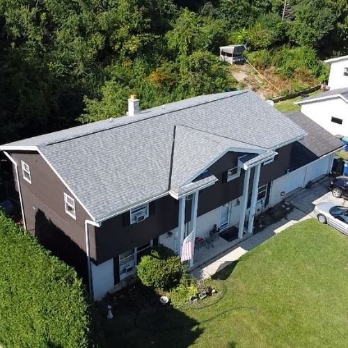 Completed roofing and siding project by Northrup's Roofing & Restoration in Milwaukee, Wisconsin.
