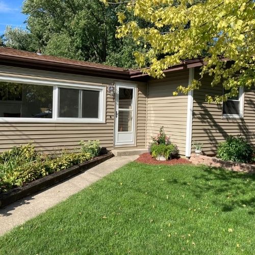 Completed siding project by Northrup's Roofing & Restoration in Milwaukee, Wisconsin.
