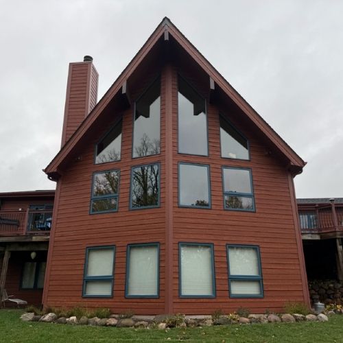 Completed window and siding project by Northrup's Roofing & Restoration in Milwaukee, Wisconsin.