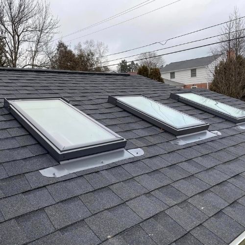 Completed roofing and skylight project by Northrup's Roofing & Restoration in Milwaukee, Wisconsin.