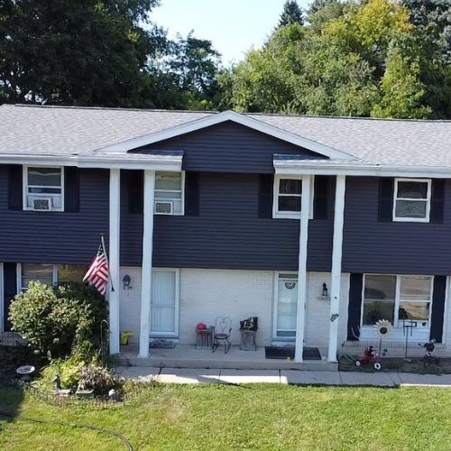 Completed roofing and siding project by Northrup's Roofing & Restoration in Milwaukee, Wisconsin.