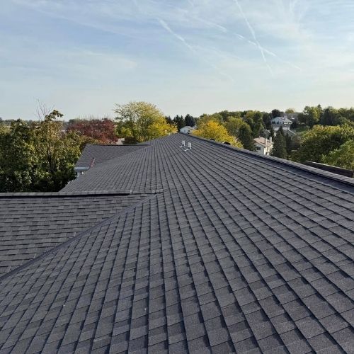 Completed asphalt roofing project by Northrup's Roofing & Restoration in Milwaukee, Wisconsin.