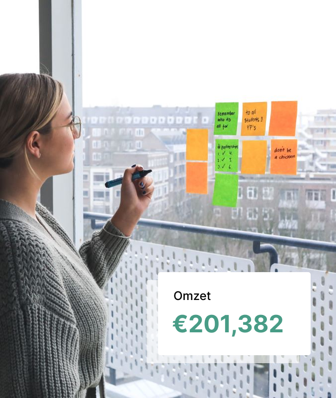 Teenage girl writing on stickey nodes