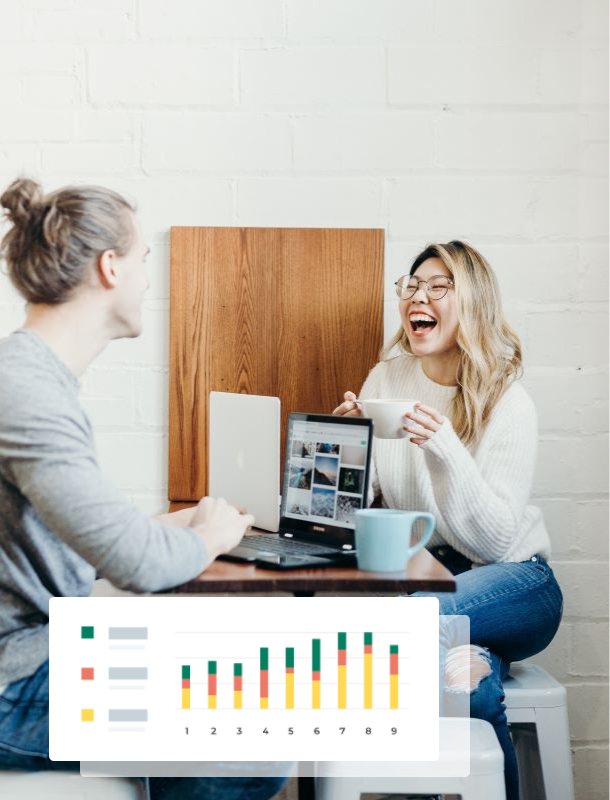 Students laughing together while drinking coffee