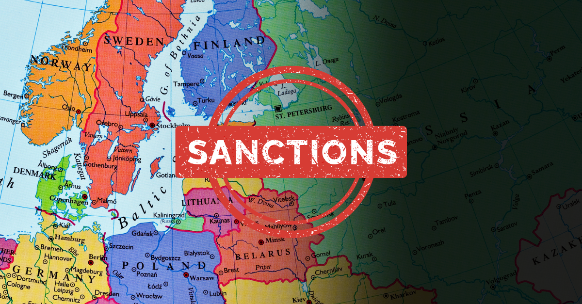 Sanctions in writing over a European map with dark clouds over Russia.
