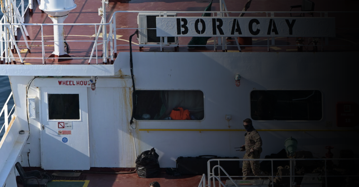 Soldier on the deck of Boracay, a russian shaddow fleet tanker