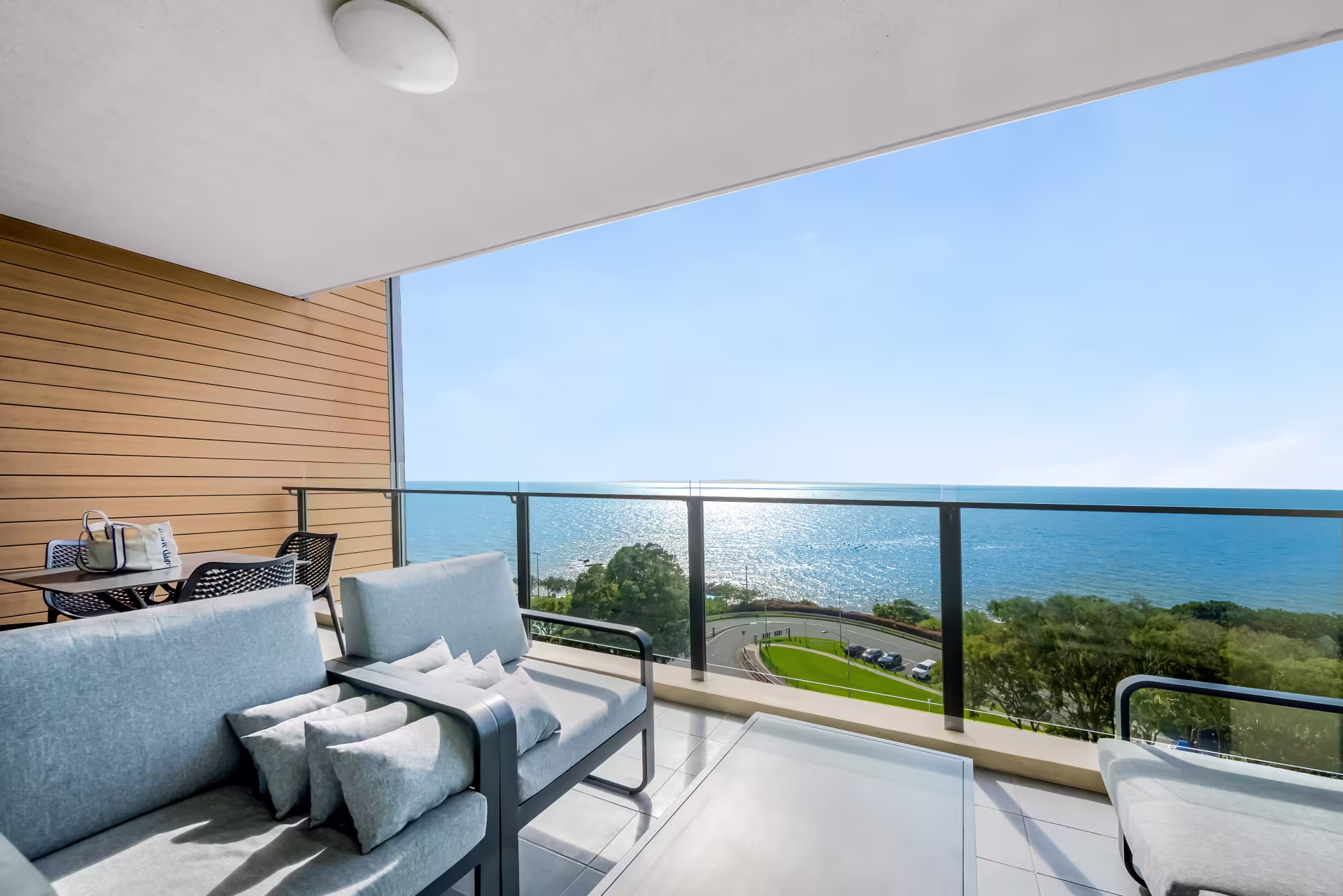 One-bedroom ocean view suite balcony overlooking Moreton Bay at Oaks Redcliffe Mon Komo Suites