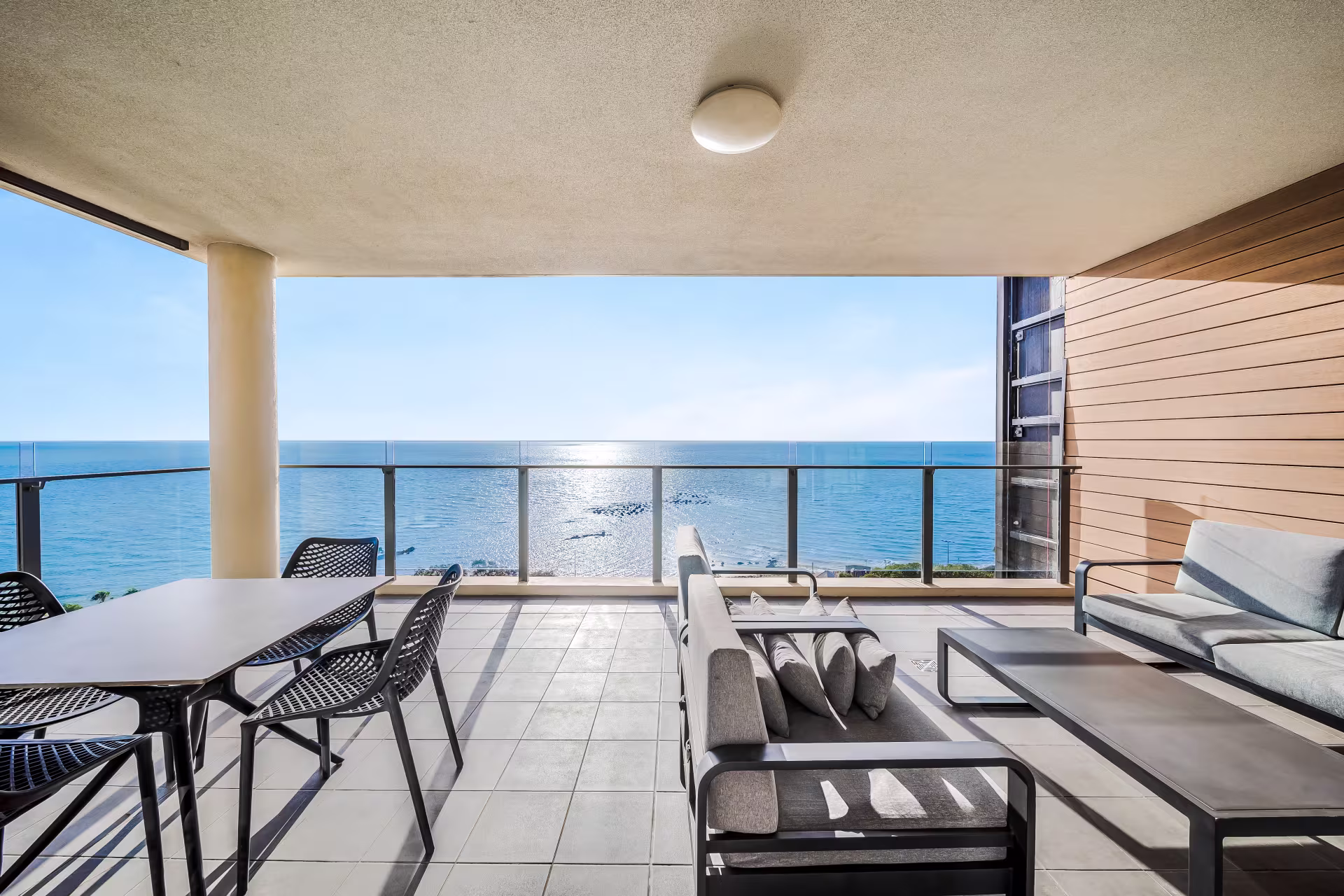Two-bedroom ocean view suite balcony at Oaks Redcliffe Mon Komo Suites