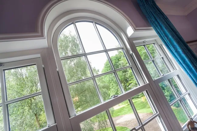 Custom arched uPvc Sliding Sash Windows