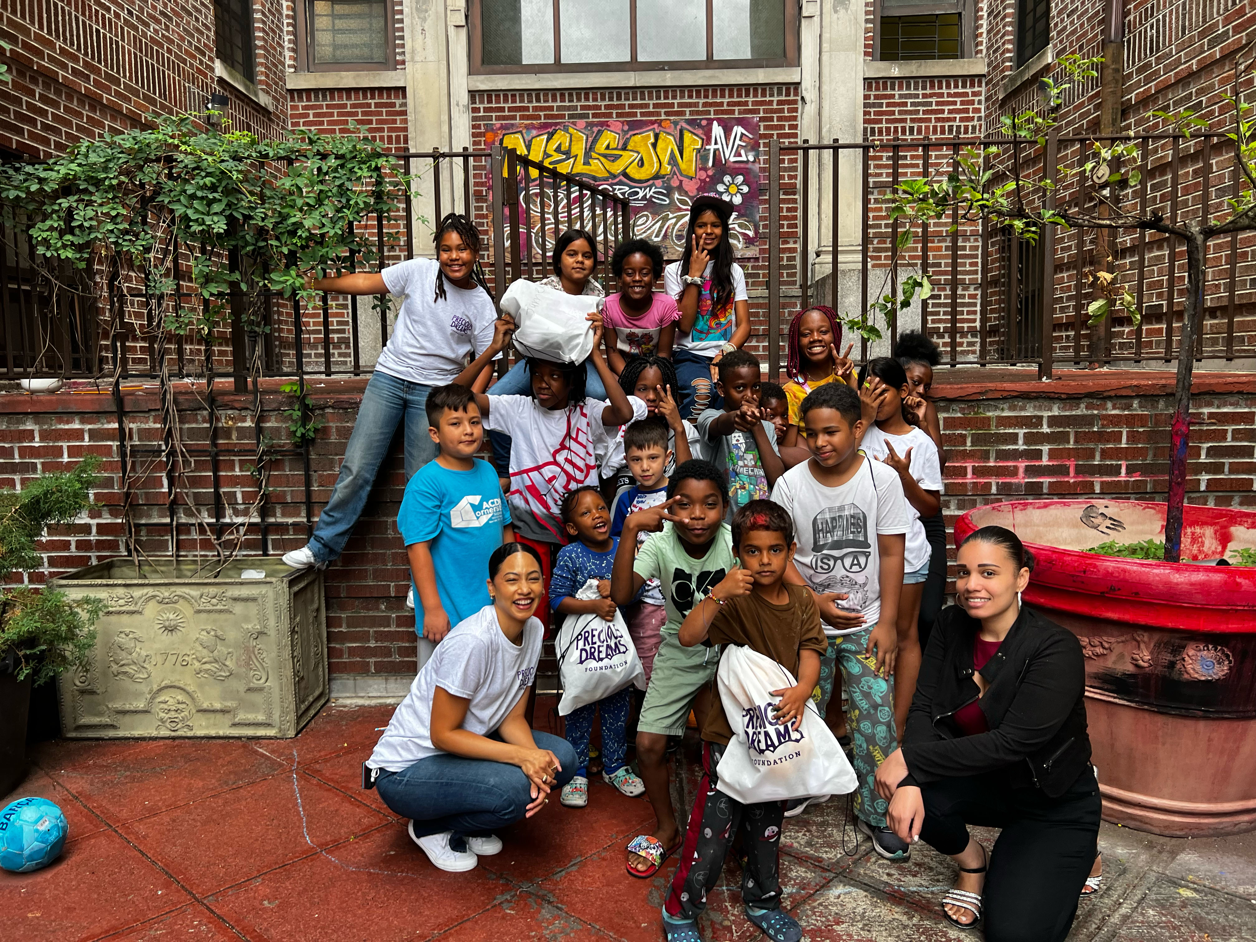 group photo of volunteers dropping off comfort items