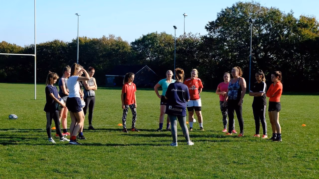 a group of women on a field