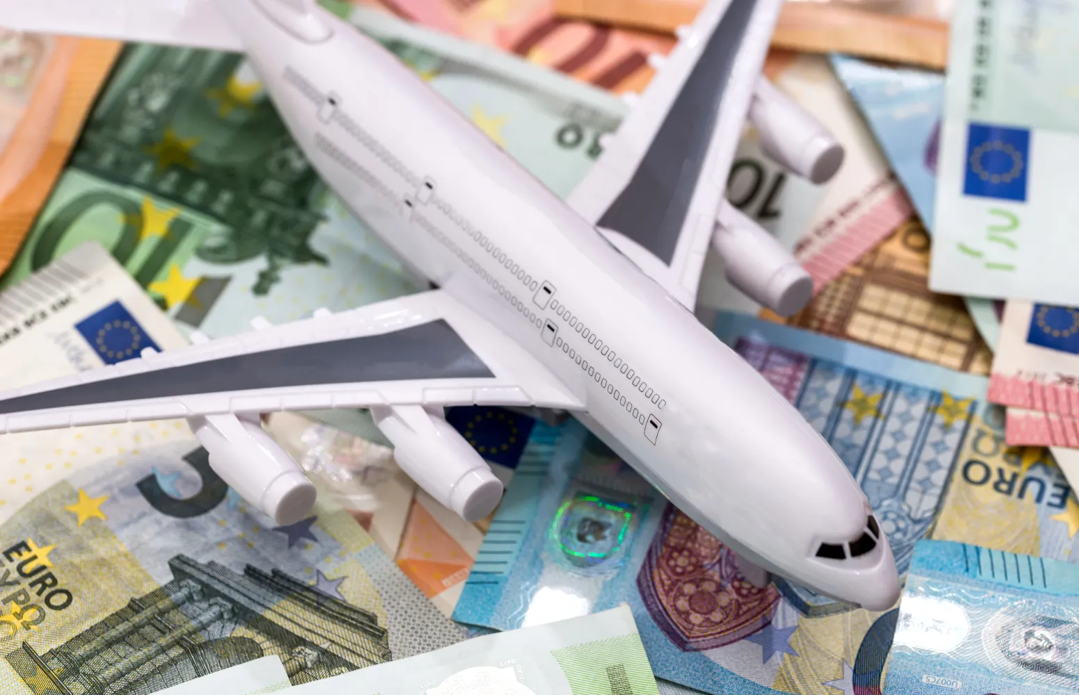 Plane and Euro banknotes