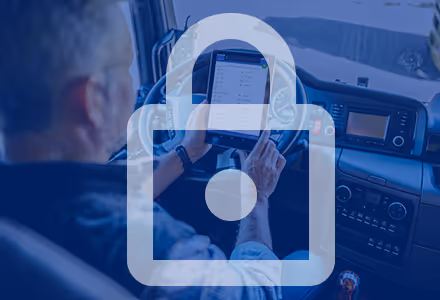 Truck driver in cab with lock icon overlay on image