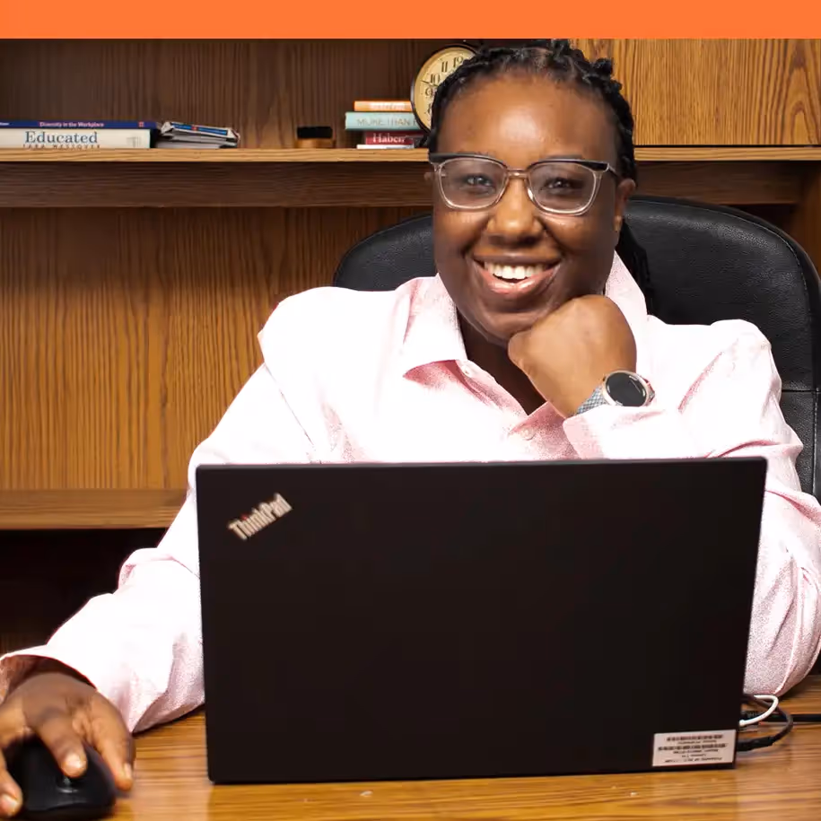 Afia at her desk | InsideTrack