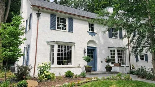 A photograph of the outside of a brick house