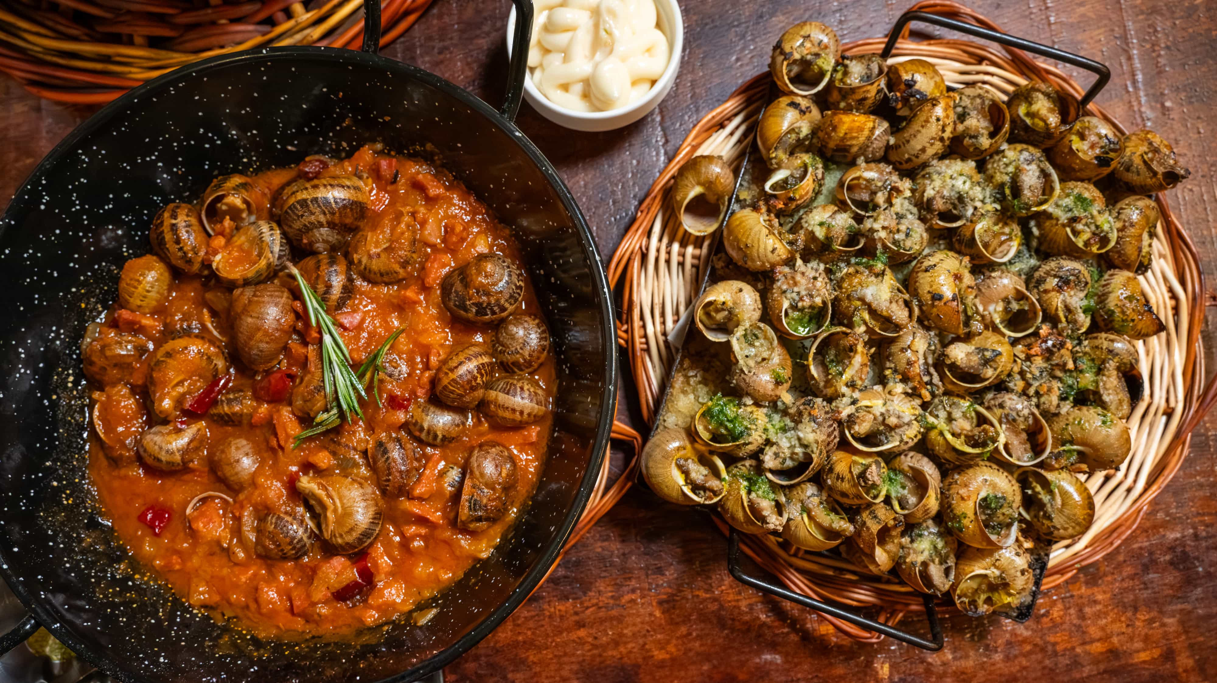 Caracoles a la llauna en Barcelona: la receta catalana que sigue viva en el Eixample