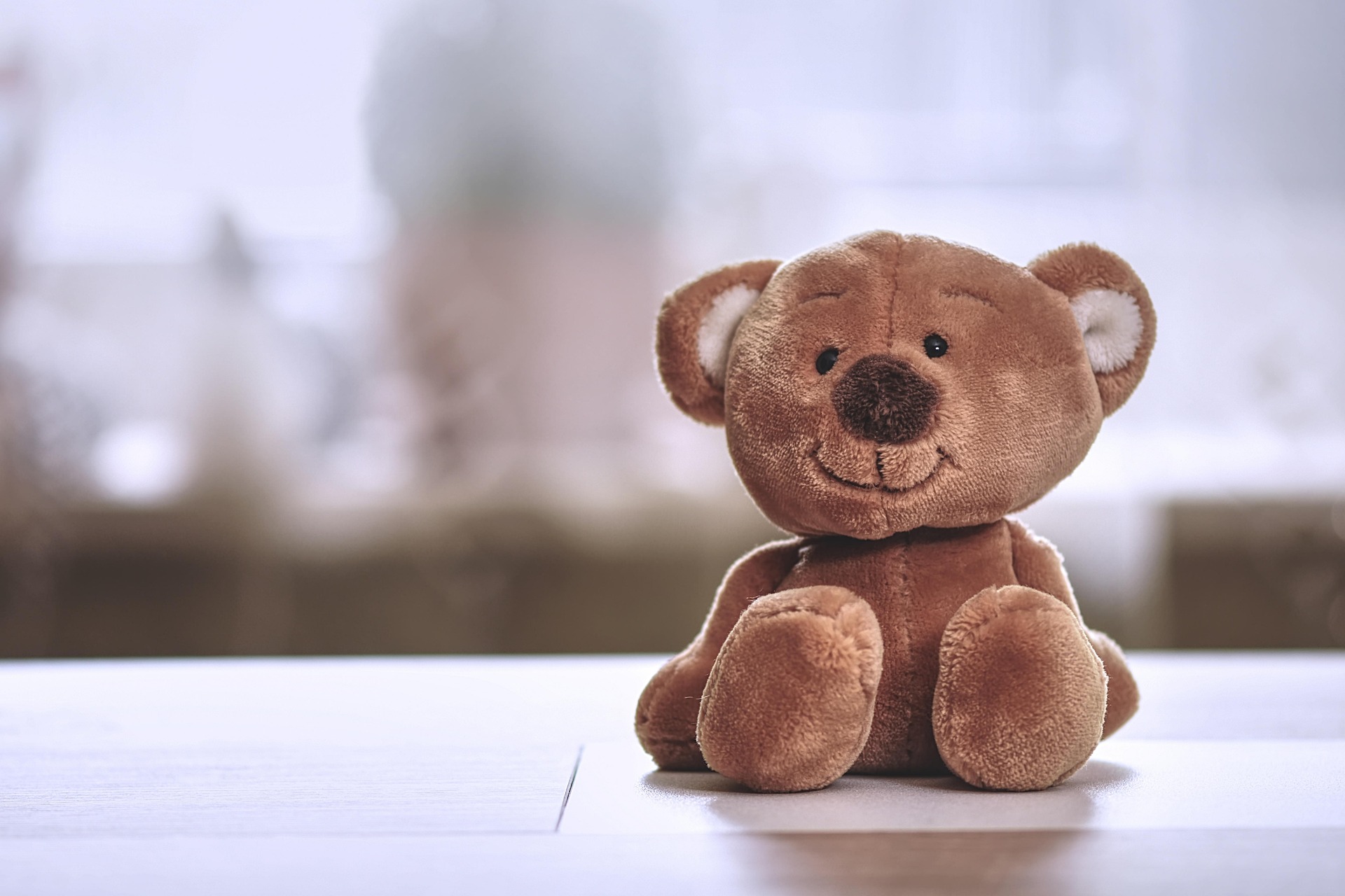 Hvit blomsterbukett formet som et hjerte