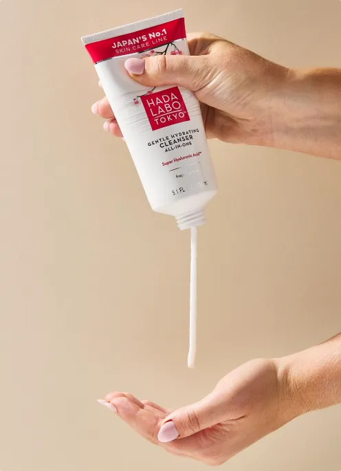 Hada Labo gente cleanser bottle squeezed by hand