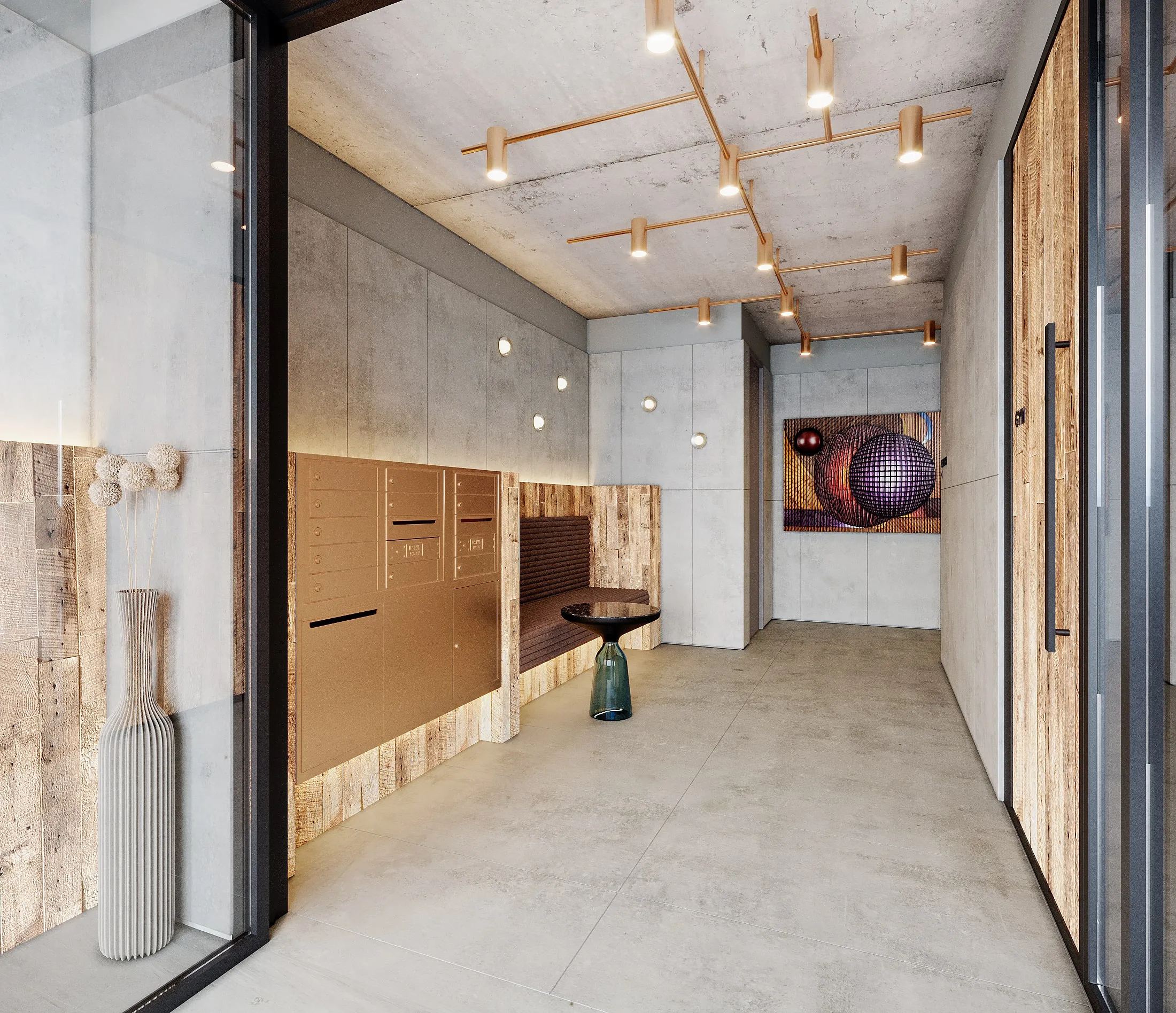 Modern lobby with concrete walls and floor, a built-in brown mailbox unit, a small seating area with a round table, contemporary ceiling lights, and abstract wall art.