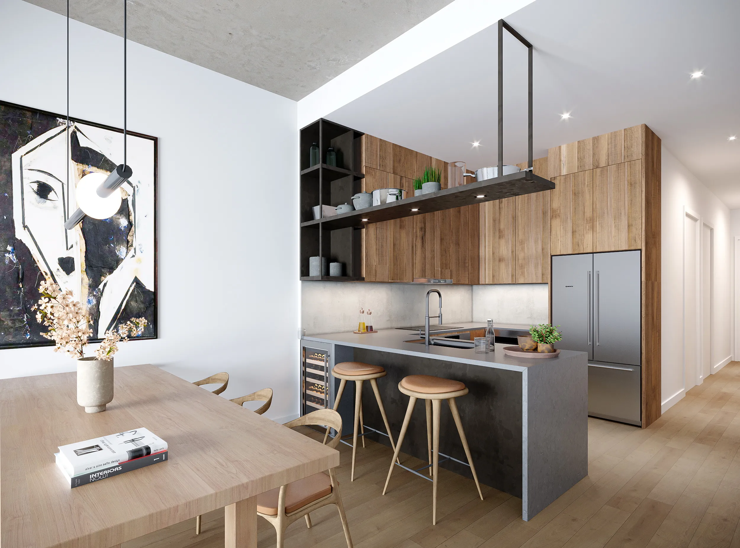 Modern kitchen with wooden cabinets, gray stone island with two stools, stainless steel refrigerator, and dining table with a vase and books.
